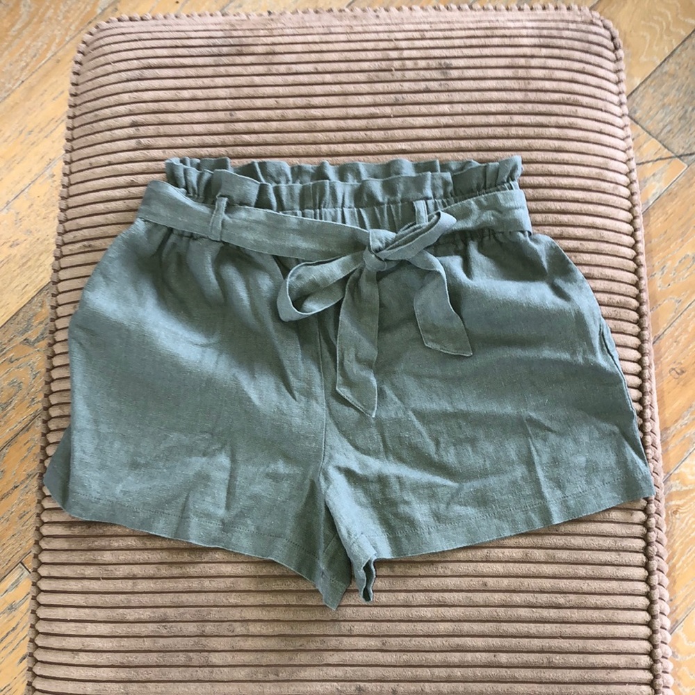 Green high waisted paper bag shorts